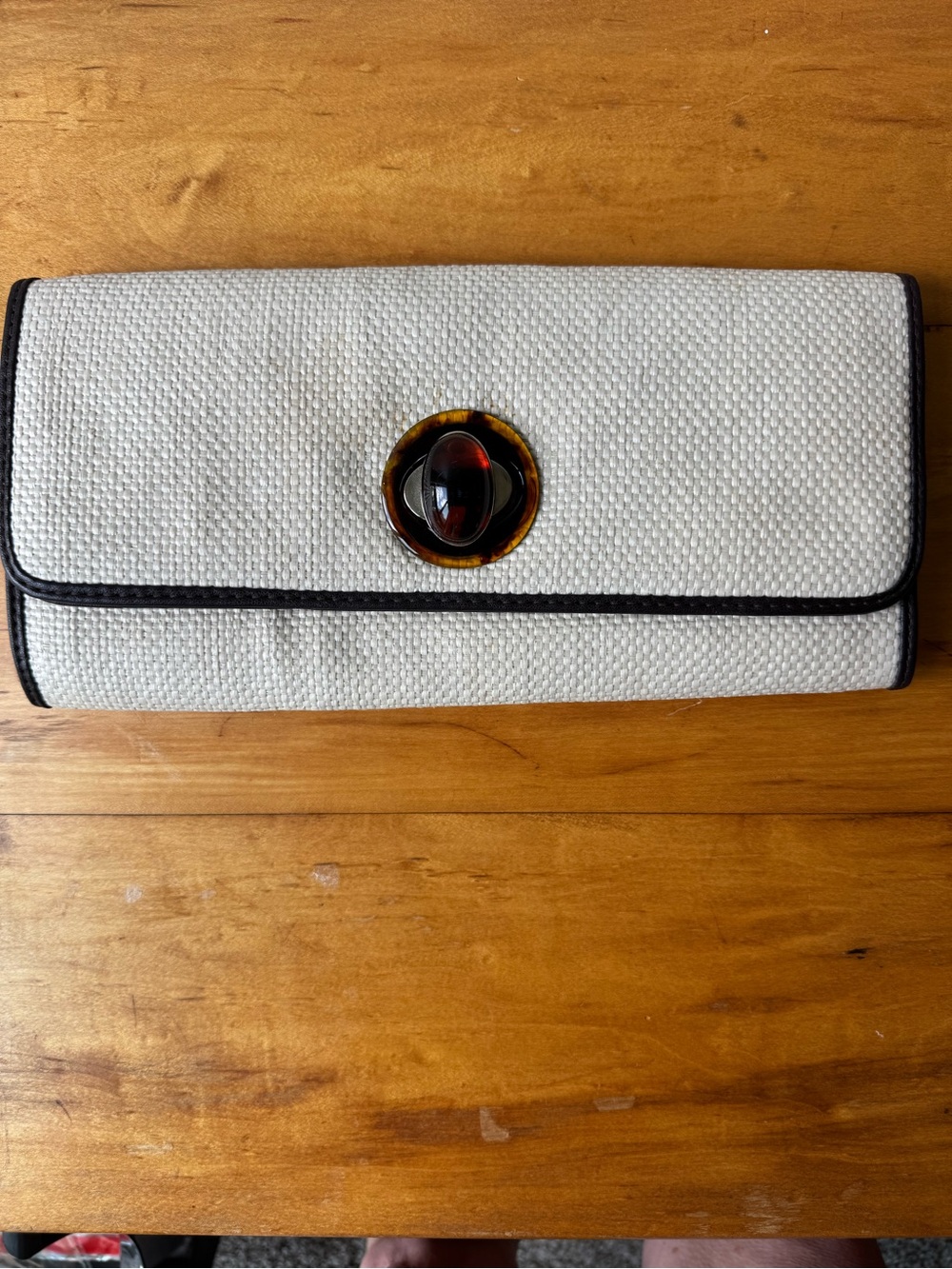 Trendy boutique Ivory Clutch with Black Trim and Tortoiseshell Accent